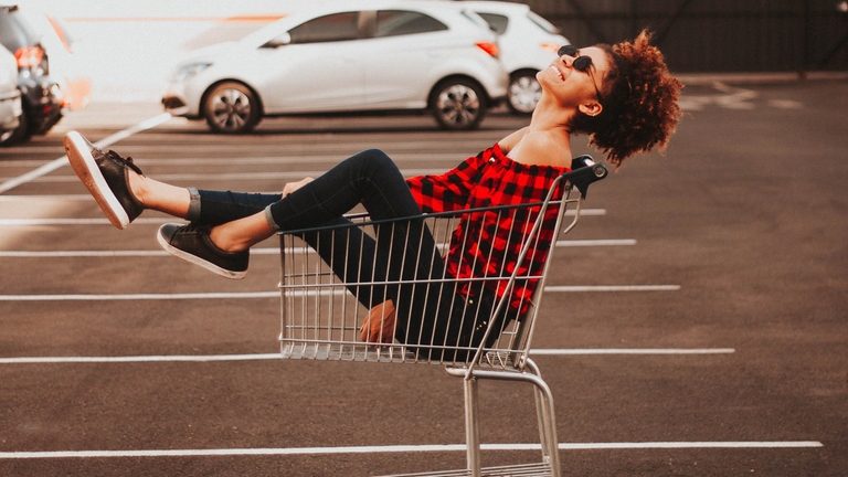 woman-in-shopping-cart-unsplash.jpg